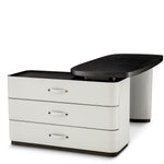 Eichholtz Desk Numana versatility. Crafted from mocha oak veneer and accented with light grey faux leather, this desk's