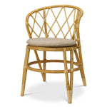 Eichholtz Dining Chair Alvaro The Alvaro Dining Chair exemplifies exceptional craftsmanship. Handwoven from natural rattan, this chair fe...