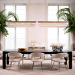 Eichholtz Dining Chair Bravo 50s furniture with modern-day design. The soft Bouclé cream upholstery gives this chair an inviting