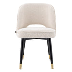 Eichholtz Dining Chair Cliff solid frame holds an armless back that is open at the bottom before the seat.