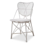 Eichholtz Dining Chair Colony Introducing the Colony Dining Chair in a chic matte white finish. Crafted with high-quality rattan,