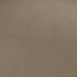 Eichholtz Dining Chair Cooper set of 2 a beige faux-leather upholstery with grey faux-leather piping, tapered black legs and brass caps....