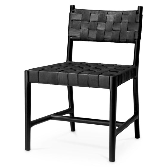 Eichholtz Dining Chair Tiberio Elevate your interiors with the Tiberio Dining Chair, a celebration of refined elegance. Sumptuous black