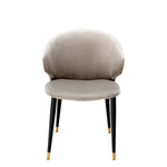 Eichholtz Dining Chair Volante with arm in a Roche beige velvet upholstery. Team up different chairs from this series for a