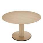 Eichholtz Dining Table Astro legs, adorned in a captivating medium bronze finish, provide a harmonious complement to the table's