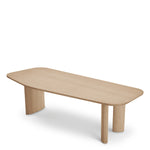 Eichholtz Dining Table Flemings of oak, creating a welcoming atmosphere in your dining area. Its irregular rectangular shape offers