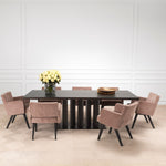 Eichholtz Dining Table Julius allure of a medium bronze finish. With a center slat wooden base, the Julius Dining