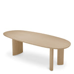 Eichholtz Dining Table Lindner elegantly curved ellipse legs. Crafted in natural oak veneer, the statement six-seater Dining Table Linder