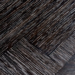 Eichholtz Dining Table Melchior oval appeal with the stunning charcoal oak veneered Melchior Dining Table that features a sturdy base