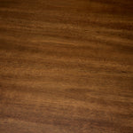 Eichholtz Dining Table Westwood finish. Its distinctive central leg, crafted from four elegant columns, adds a bold architectural element.