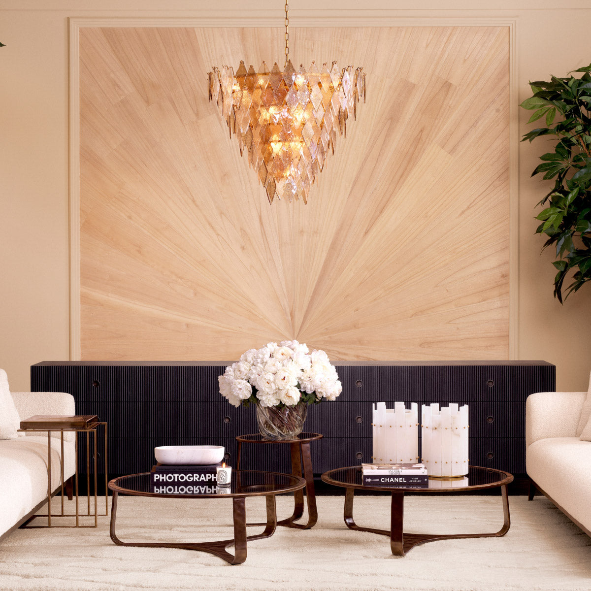 Eichholtz Drawer Chest Dimitrios wood panels and burnished bronze accents, this piece transcends modern luxury. The refined finish offers