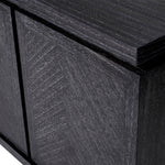 Eichholtz Dresser Bowen has four handle-less doors that leave a graceful impression with their refined herringbone patterns. Dresser