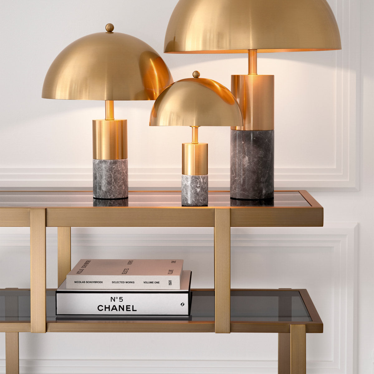 Eichholtz Dresser Nesto room or study. Its stepped carcass has a brushed brass finish and sits on an