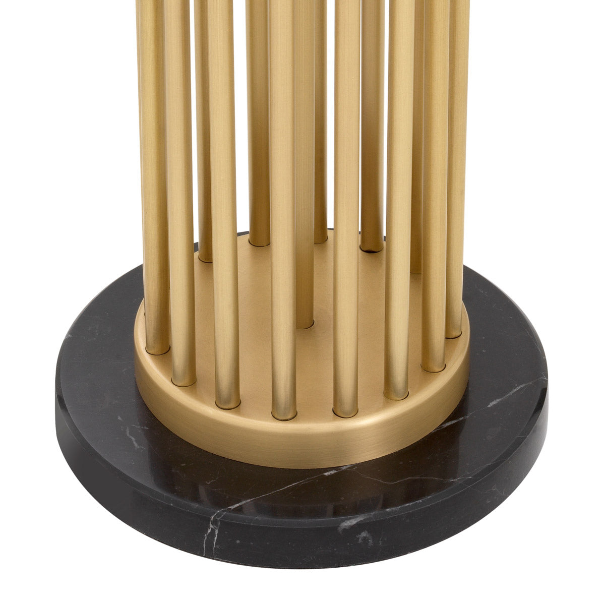 Eichholtz Floor Lamp Condo an antique brass finish. The fixture comes complete with a round black drum shade with