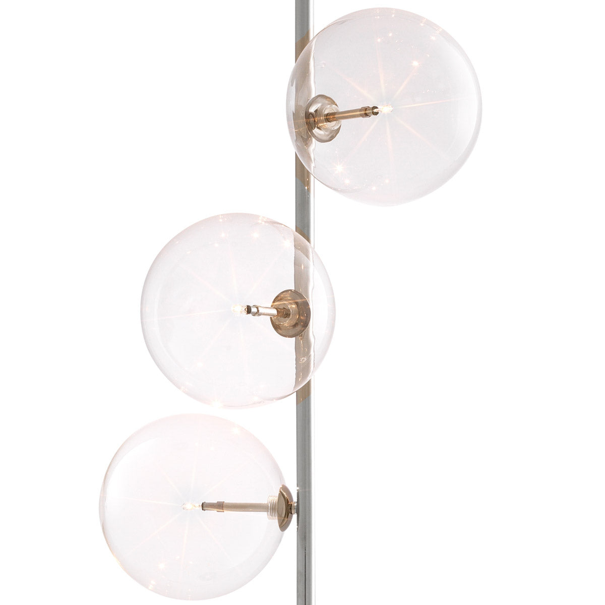 Eichholtz Floor Lamp Tempo 5 white glass spherical lampshades and a metal fixture with an antique brass finish and