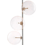 Eichholtz Floor Lamp Tempo 5 white glass spherical lampshades and a metal fixture with an antique brass finish and