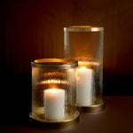 Eichholtz Hurricane Harrington L this vintage style candle holder features a cylindrical jar from ribbed cut glass and a
