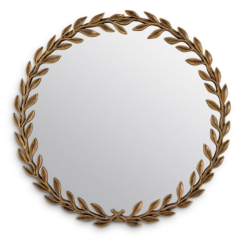 Eichholtz Mirror Duras Showcasing a wreath of leaves to create a botanical look, the vintage brass Duras Mirror