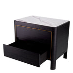Eichholtz Nightstand Corazon enhance the style of your bedroom. The drawers are framed by a brushed brass rim