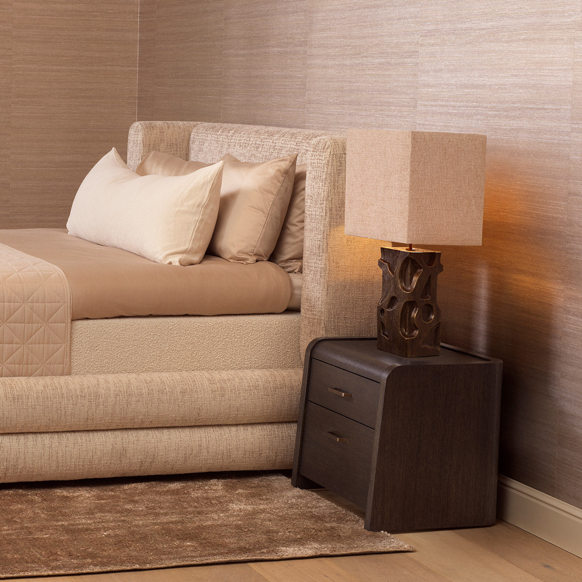 Eichholtz Nightstand Joane contours and refined bronze finish radiate sophistication, while two spacious drawers offer chic storage. Perfect