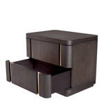 Eichholtz Nightstand Modesto with shiny brushed brass inserts and a solid base. Nightstand Modesto Crafted by Eichholtz this