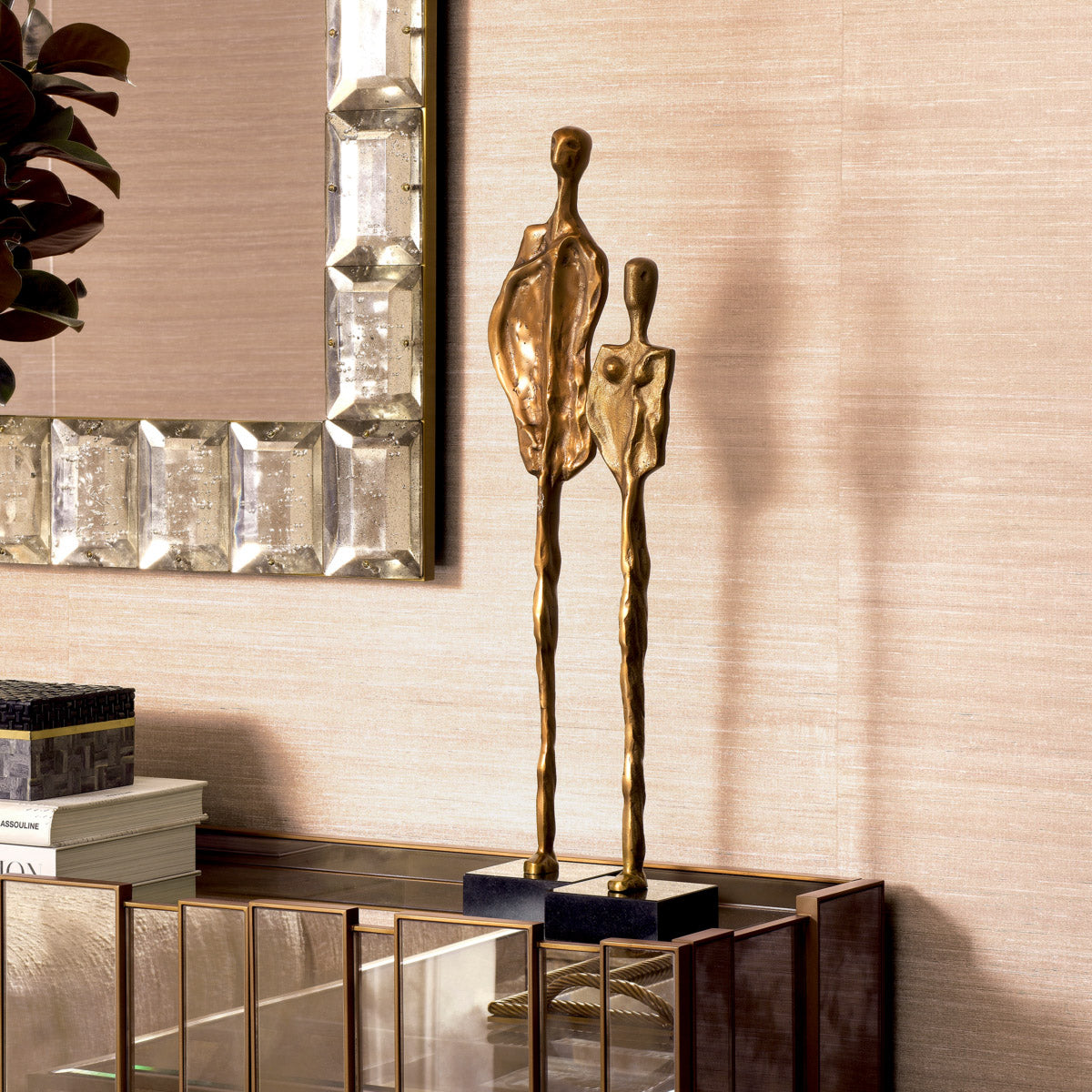 Eichholtz Object Dual set of 2 design. With vintage brass finishes atop sleek black granite bases, the pair commands attention and