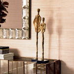 Eichholtz Object Dual set of 2 design. With vintage brass finishes atop sleek black granite bases, the pair commands attention and