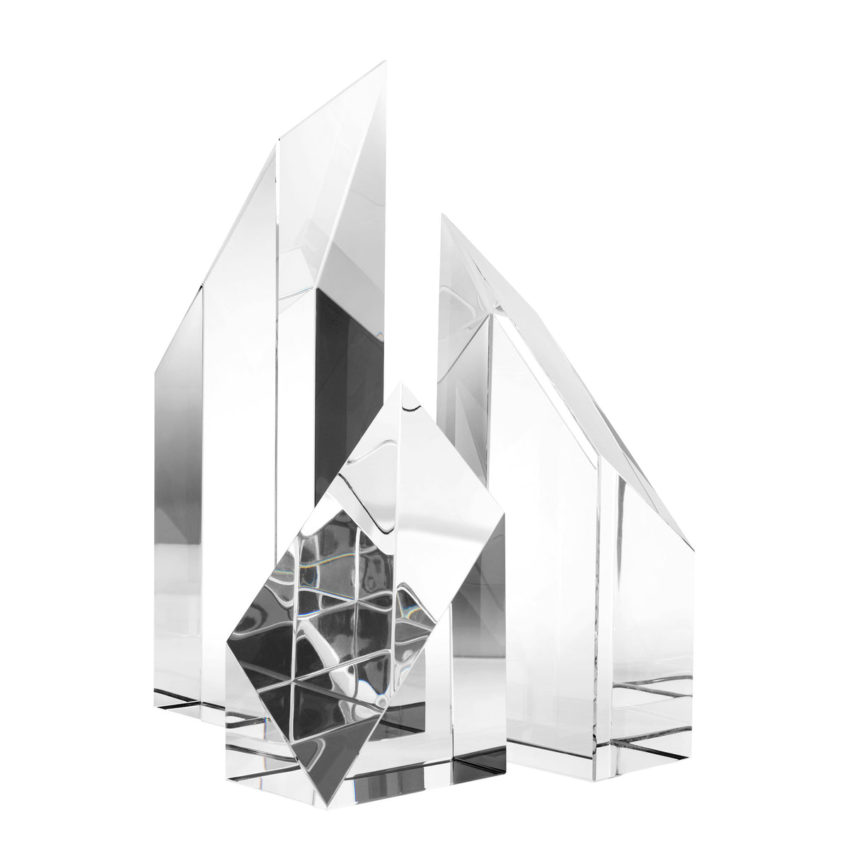 Eichholtz Object Scope set of 3 clear crystal glass has a bevelled top. Together they look like tightly packed skyscrapers that