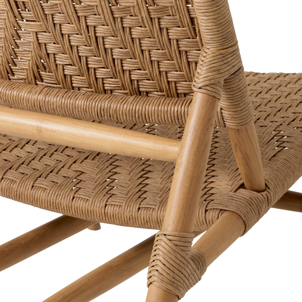 Eichholtz Outdoor Chair and Foot Stool Laroc set that seamlessly combines natural teak wood with the practicality of polyethylene seats a...