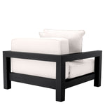 Eichholtz Outdoor Chair Cap-Antibes a black powdercoated finish. Its seat and back cushions are upholstered in Sunbrella canvas. Outdoor