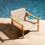 Eichholtz Outdoor Chair Honolulu wood with the practicality of polyethylene seats and backrests. Responsibly sourced from sustainable for...