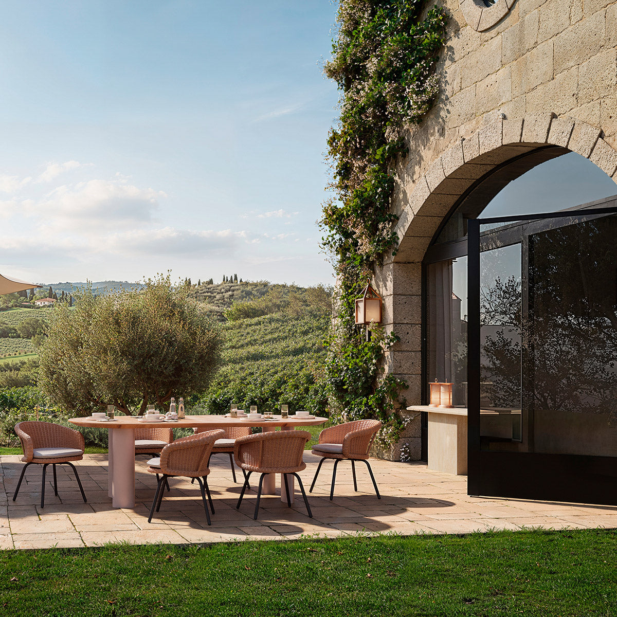Eichholtz Outdoor Console Table Charles concrete, its faux travertine finish exudes a timeless elegance. Perfectly blending durability wi...
