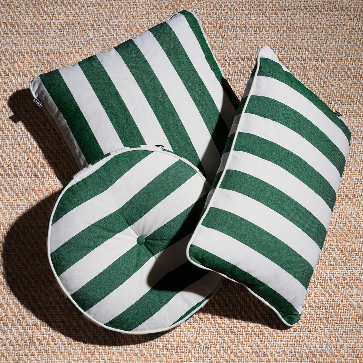 Eichholtz Outdoor Cushion Florent Round stripes. This stylish Eichholtz upholstered cushion features classic yet modern green stripes and...