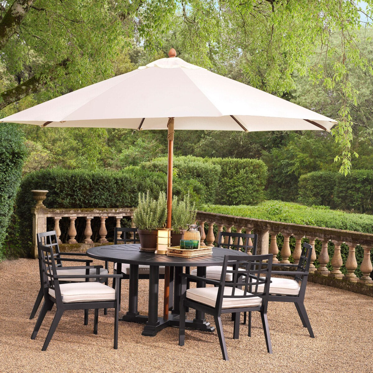 Eichholtz Outdoor Dining Chair Cap-Ferrat chair. Oozing luxury and high-style, this lovely black finish dining chair with arms will stand