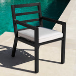Eichholtz Outdoor Dining Chair Delta complement Dining Table Vistamar, this black finish dining chair with arms features a sleek silhouette.