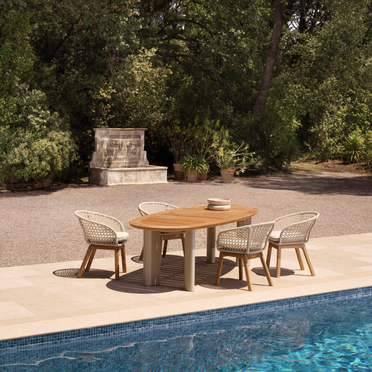 Eichholtz Outdoor Dining Table Free Form powder coated in a sand-colored tone exude a touch of sophistication and natural beauty. Perfect