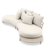 Eichholtz Outdoor Sofa Laguno a cozy seating experience. As a bonus, this sofa comes with a side table, allowing