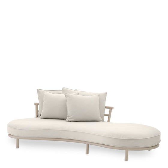 Eichholtz Outdoor Sofa Laguno left Elevate your outdoor lounging experience with the Laguno Outdoor Sofa. With a sand finish that