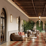 Eichholtz Outdoor Sofa Siderno modern comfort. The stylish faux rattan complements the viola sand fabric, and plenty of cushions