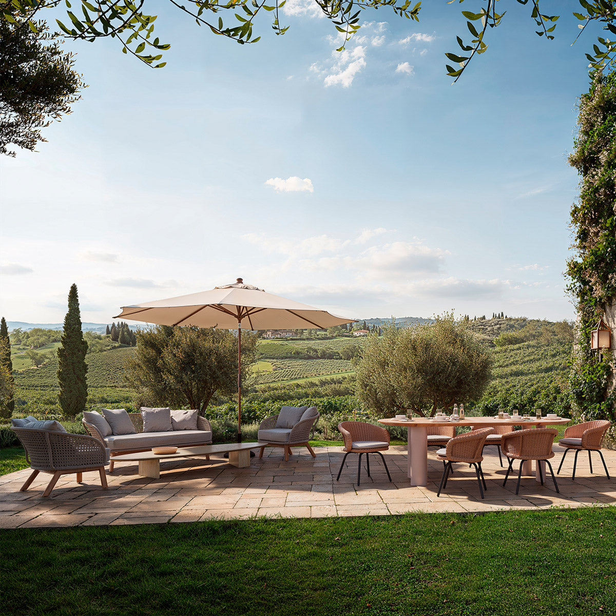 Eichholtz Outdoor Sofa Trinity and plush cushions offer the ultimate in outdoor opulence, inviting you to indulge in serene