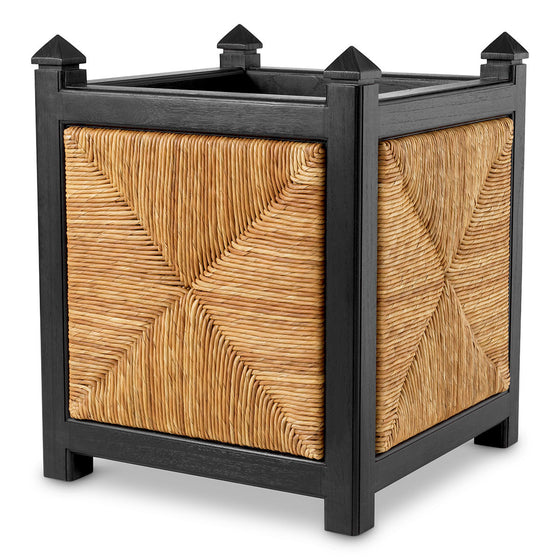 Eichholtz Planter Aruba Introducing the Aruba Classic Black Finish Planter, where modern aesthetics meet natural materials. Crafted with