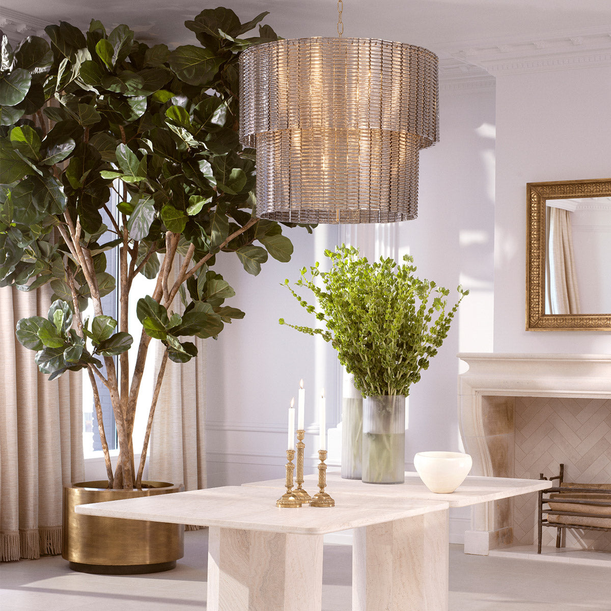 Eichholtz Planter Jasper round XS showcases a vintage brass finish, imbuing it with a sophisticated antiquity ideal for any luxury