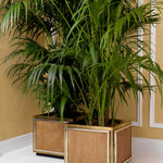 Eichholtz Planter Tropea rattan. This Eichholtz piece, rendered in a vintage brass finish, offers a unique blend of