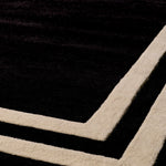 Eichholtz Rug Celeste 118.11 in x 157.48 in The beautiful black and off-white Celeste Carpet 118.11 in x 157.48 in instantly enhances the overall look and