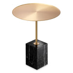 Eichholtz Side Table Cole on a block of black marble with white veins, giving it a chic and elegant