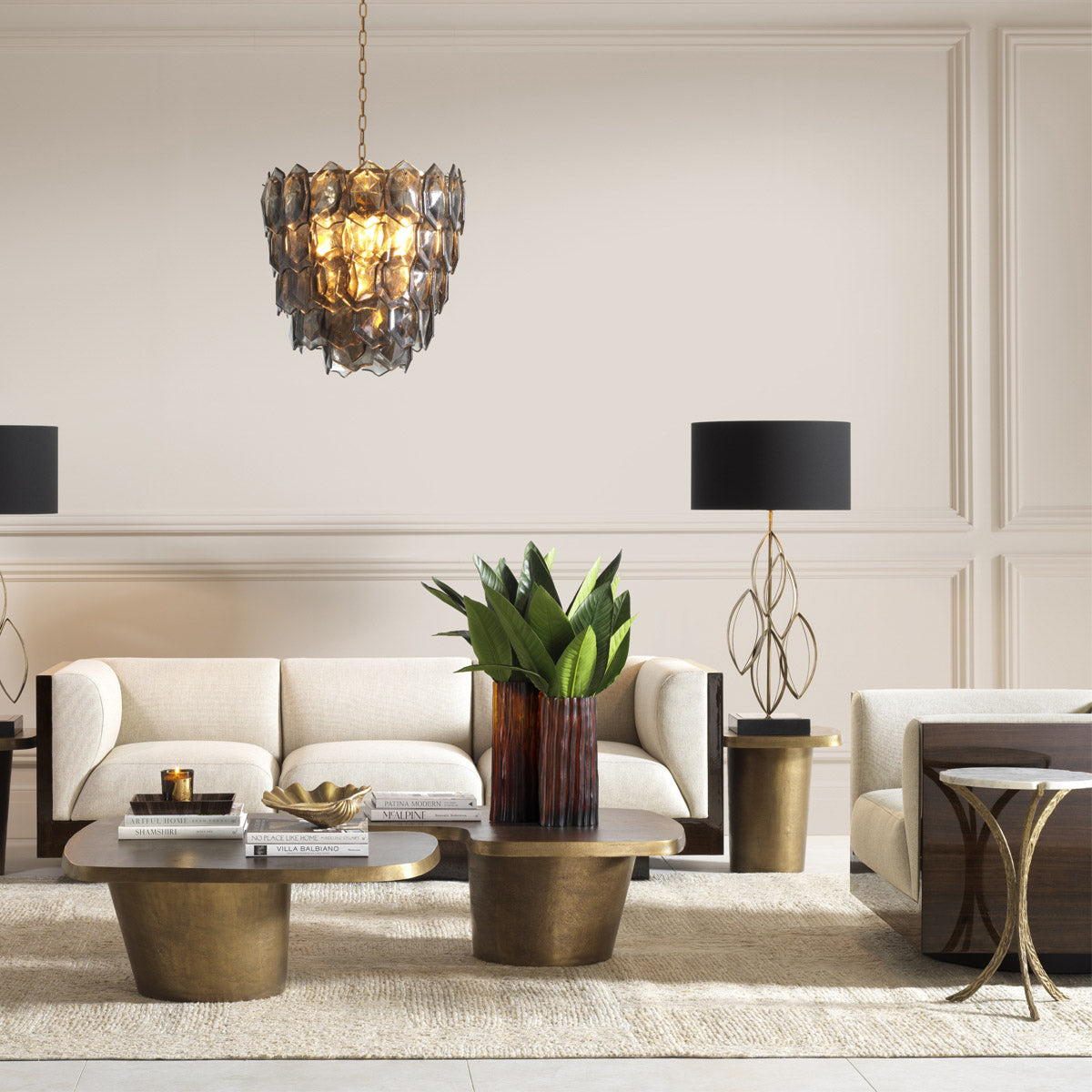 Eichholtz Side Table Emmeline rests atop a gracefully hammered vintage brass base, offering an elegant fusion of timeless materials.