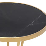 Eichholtz Side Table Horatio your aesthetic. Featuring a brushed brass finish, its tapered frame rests on a round base.