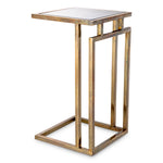 Eichholtz Side Table Marcus essence of timeless allure with rich golden hues, the interplay of vintage brass and the