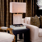 Eichholtz Side Table Metropolitan from the sleek lines of The Met's front steps, this piece evokes the elegance of