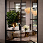 Eichholtz Side Table Nuova marble top and a vintage brass finish. This opulent side table introduces timeless elegance into